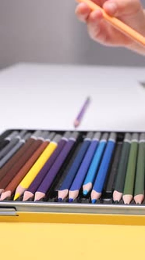 Child Hand Choosing Color Pencils For Art