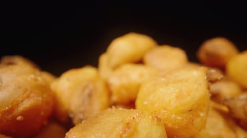 Dried corn kernels with spices. Dolly slider extreme close-up.