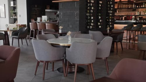 Modern Restaurant with Elegant Wine Display and Comfortable Seating
