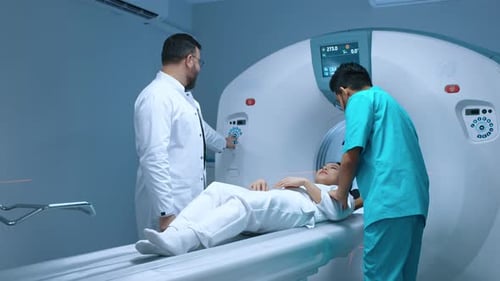 Woman Undergoes CT Scan in Hospital Room