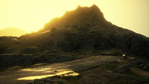 Scenic View of Empty Road Amidst Volcanic Landscape