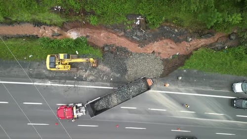 Aerial View of Road Construction, Equipment, and Traffic
