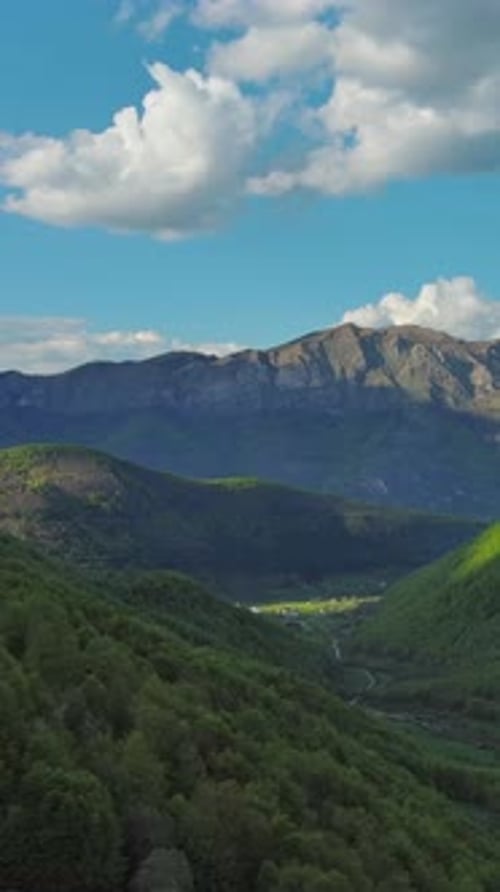 Rocky mountains and valley before sunset aerial