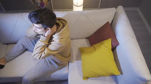 Tired and exhausted man is sleeping.