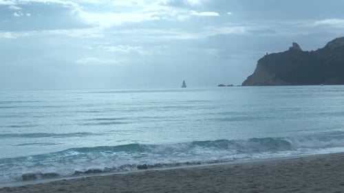 a sailboat sailing over the horizon