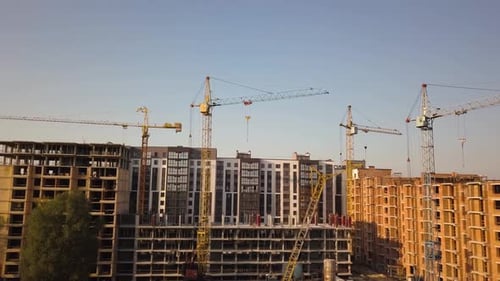 Aerial View of Tall Residential Apartment Buildings Under Construction