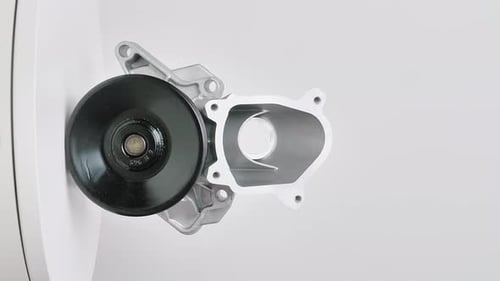 Close-Up of Silver and Black Car Water Pump
