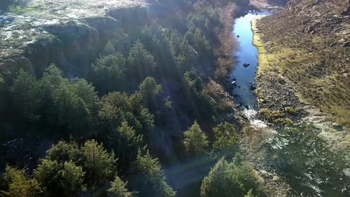 Drone, mountain and river with canyon for vacation, trip or hike in nature with trees