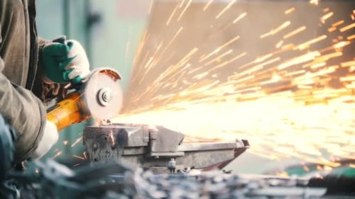 Industrial Concept A Man Worker Cut the Chain with a