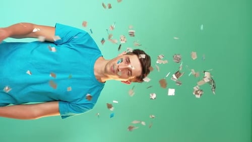 Young Man Celebrates with Confetti on Birthday