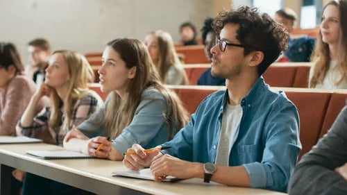 In the University Lecture Hall Multi Ethnic Group of Students Listening Attentively. Auditorium Fil