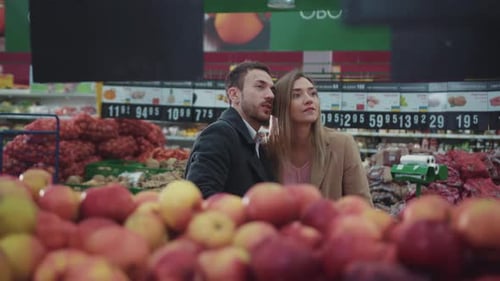 Attractive Young Couple Walk Around Healthy Produce Products Together in Supermarket Girl Shopping