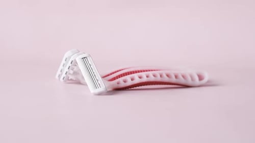 Close Up of Pink Color Razor on Table