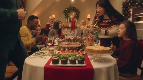 Family and Friends Gather for Festive Christmas Dinner