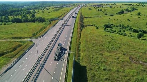Transport Interchange on the Highway Aerial of Cars Drive Along the Highway Outside the City