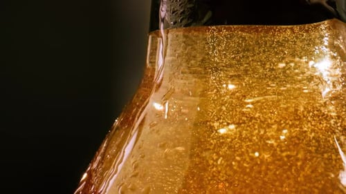 Close Up of Cold Amber Bottle of Beer