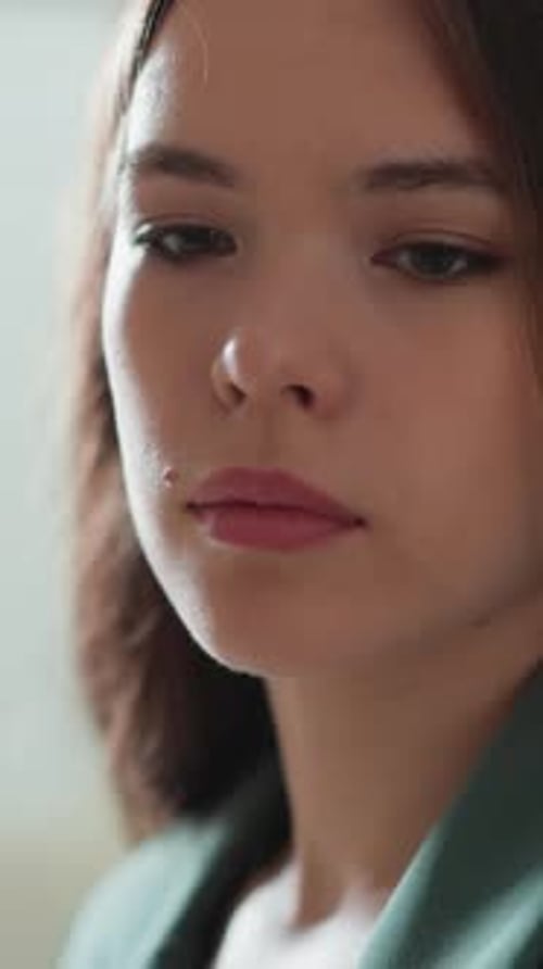 Close-Up of Woman's Face and Shoulders