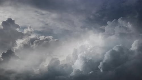 4k view of lightning flashes inside dark clouds in the dark sky