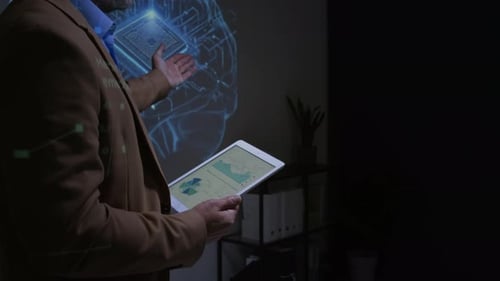 Man Presenting AI Brain Design on Tablet