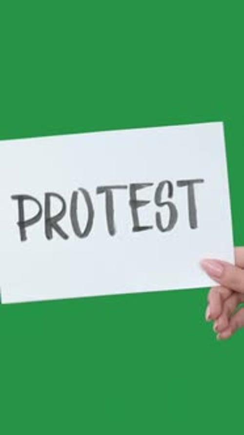 Hand Holding Protest Sign Against Green Screen