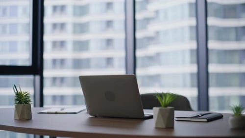 Modern Empty Workspace Laptop on Office Desk Corporate Environment for Work
