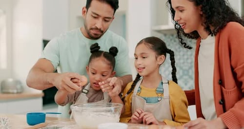 Family Baking Together in Bright Kitchen