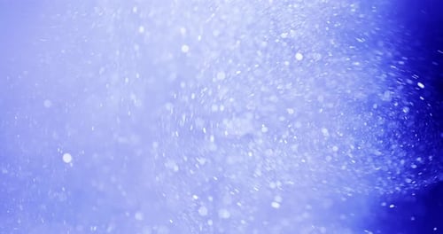 Abstract Blue Particle Background with Bokeh