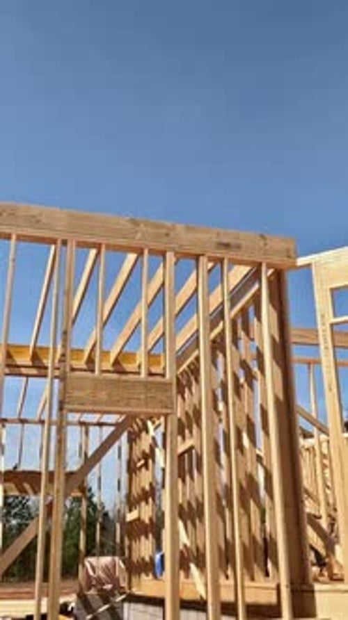 On Construction Site There are Beams of Wood Stick Framing Which Will Serve As Framework for a New