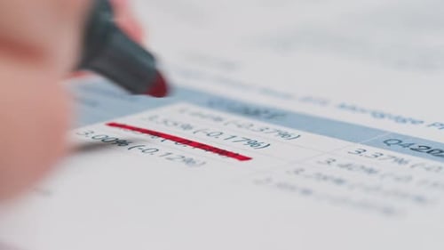 Closeup of Paper Blank Loan Repayment calculationMortgage Payment Sheet Schedule Loan Fee Business