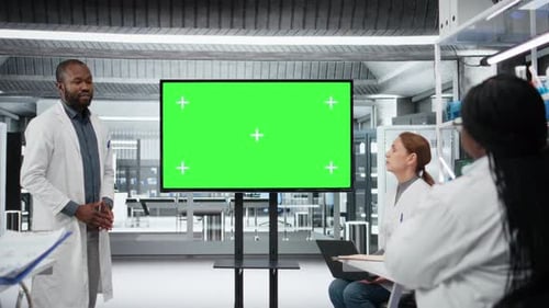 Chroma Key Display Used By Professor Mentoring Researchers During Workshop
