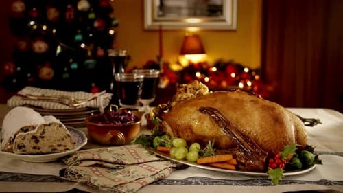 Festive Christmas Dinner Table with Turkey and Decorations