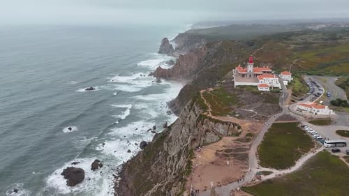 Aerial View of Cabo Da Roca Lighthouse and Atlantic Ocean Cliffs in Portugal