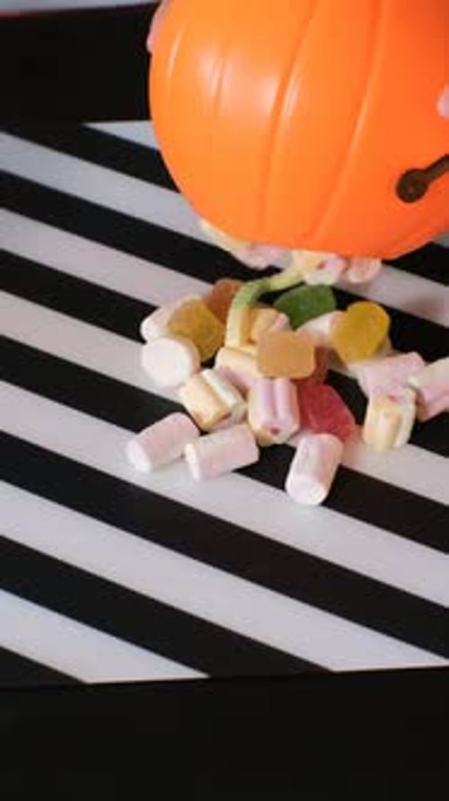 Halloween Candy Poured Out by Child at Home
