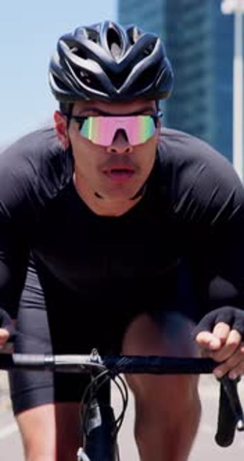 Cyclist, man and cycling on bike in city for cardio workout, endurance challenge and pace training