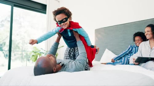 Man, child and superhero or bed game for morning connection or superman costume, playing or holiday