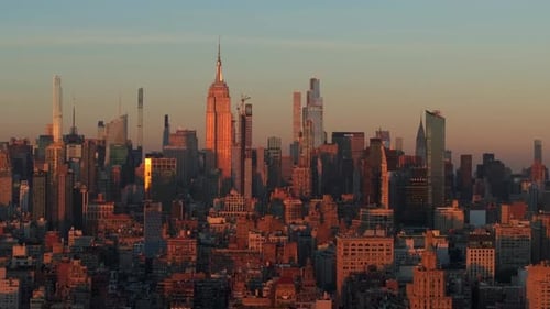 Warm Sunlight Bathes the Empire State Building and Nearby Skyscrapers of Midtown Manhattan Sun Rises