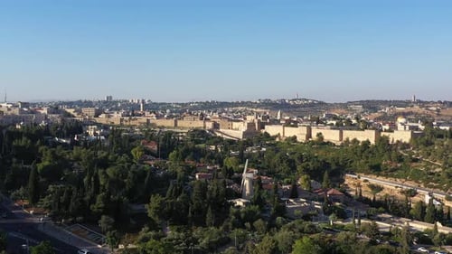 The old city of Jerusalem walls at sunset, aerial view