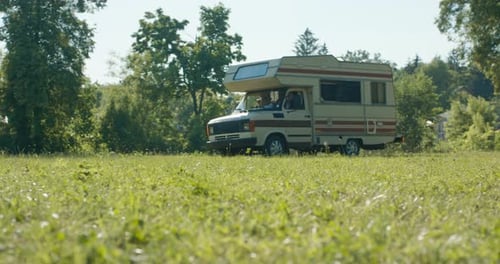 Camper Vehicle of Friends Arrives at the Lake