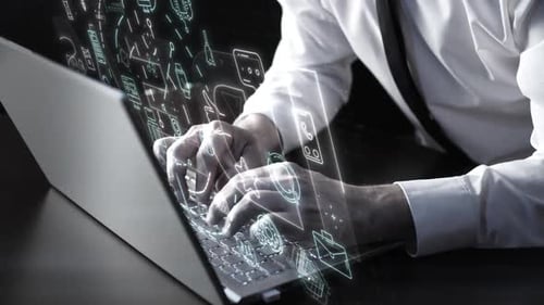 Businessman Working on Laptop with Digital Communication Icons Overlay