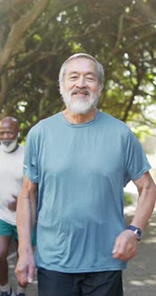 Face, old man and running in park for fitness, exercise challenge and wellness with healthy body