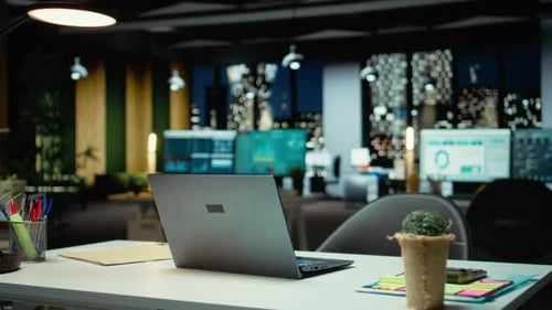 Empty Business Office at Night Showcasing Data Reports and Analytics