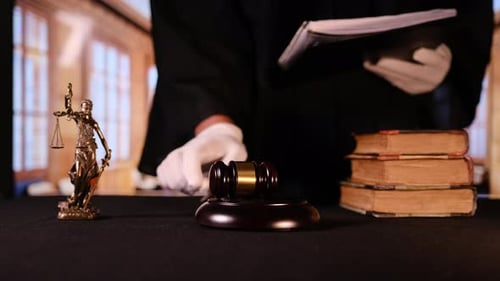 A Judge Diligently Prepares to Make an Important Ruling with a Gavel and Various Legal Books in a