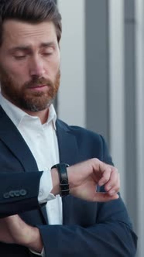 Angry Caucasian Mature Business Man Waiting Looking at Wristwatch Sad Businessman Checking Time