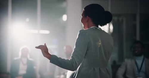 Woman Giving Presentation at Corporate Conference