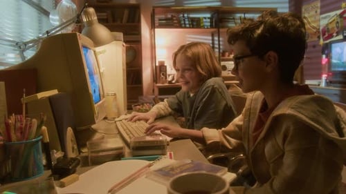 Children Playing Vintage Computer Game in Bedroom