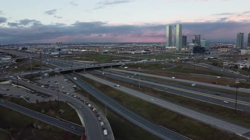 Aerial view of cars driving at crossroads. Traffic highway transportation. Business center. Multi-le