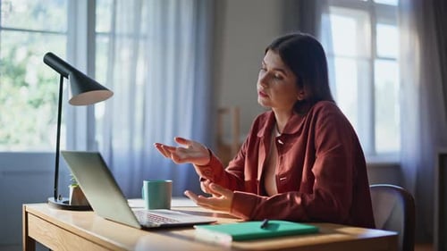 Young Woman Working Remotely at Desk
