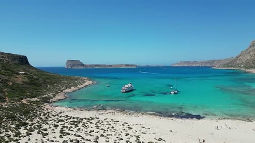 Aerial Drone View of Balos Beach Lagoon with Boats in Crete Greece