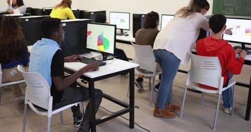 Young Multiracial Students Using Computer at School Academic