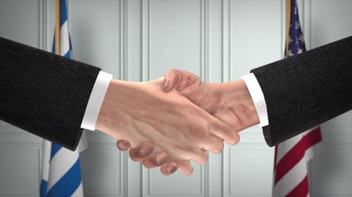International Business Agreement Handshake with Waving Flags